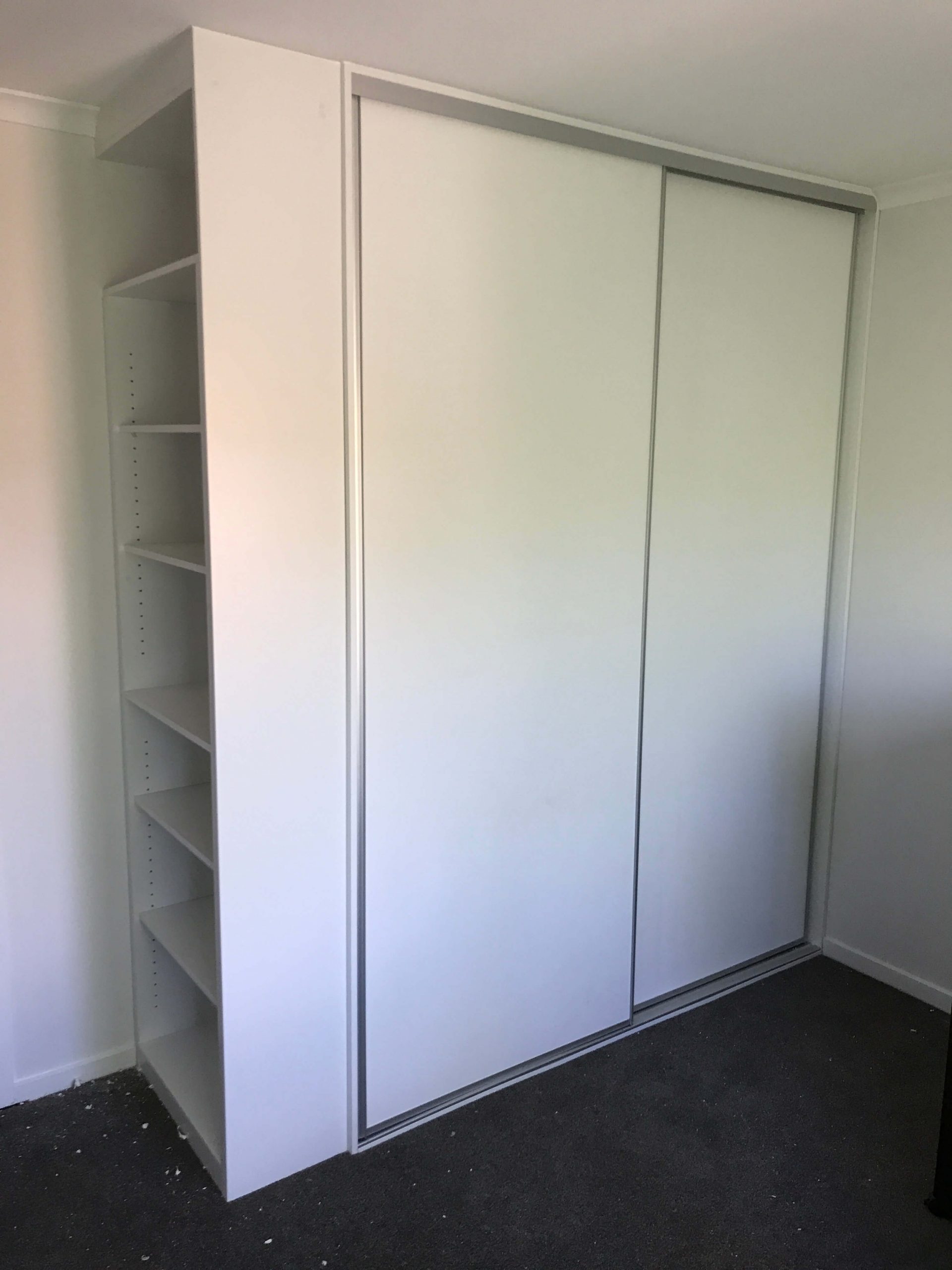 Robe with external bookcase