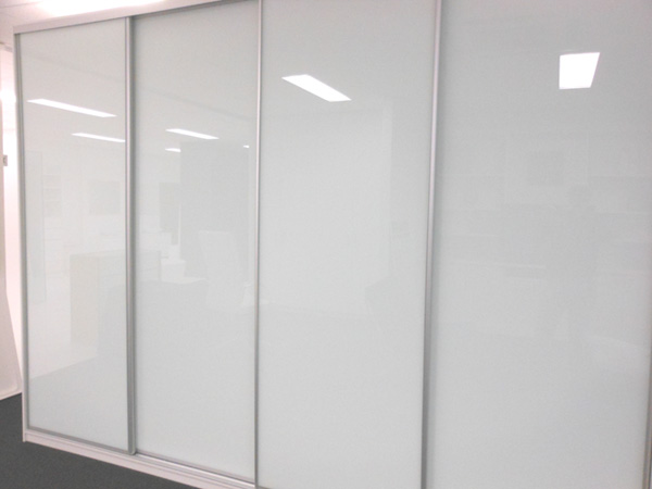 White glass framed sliding doors