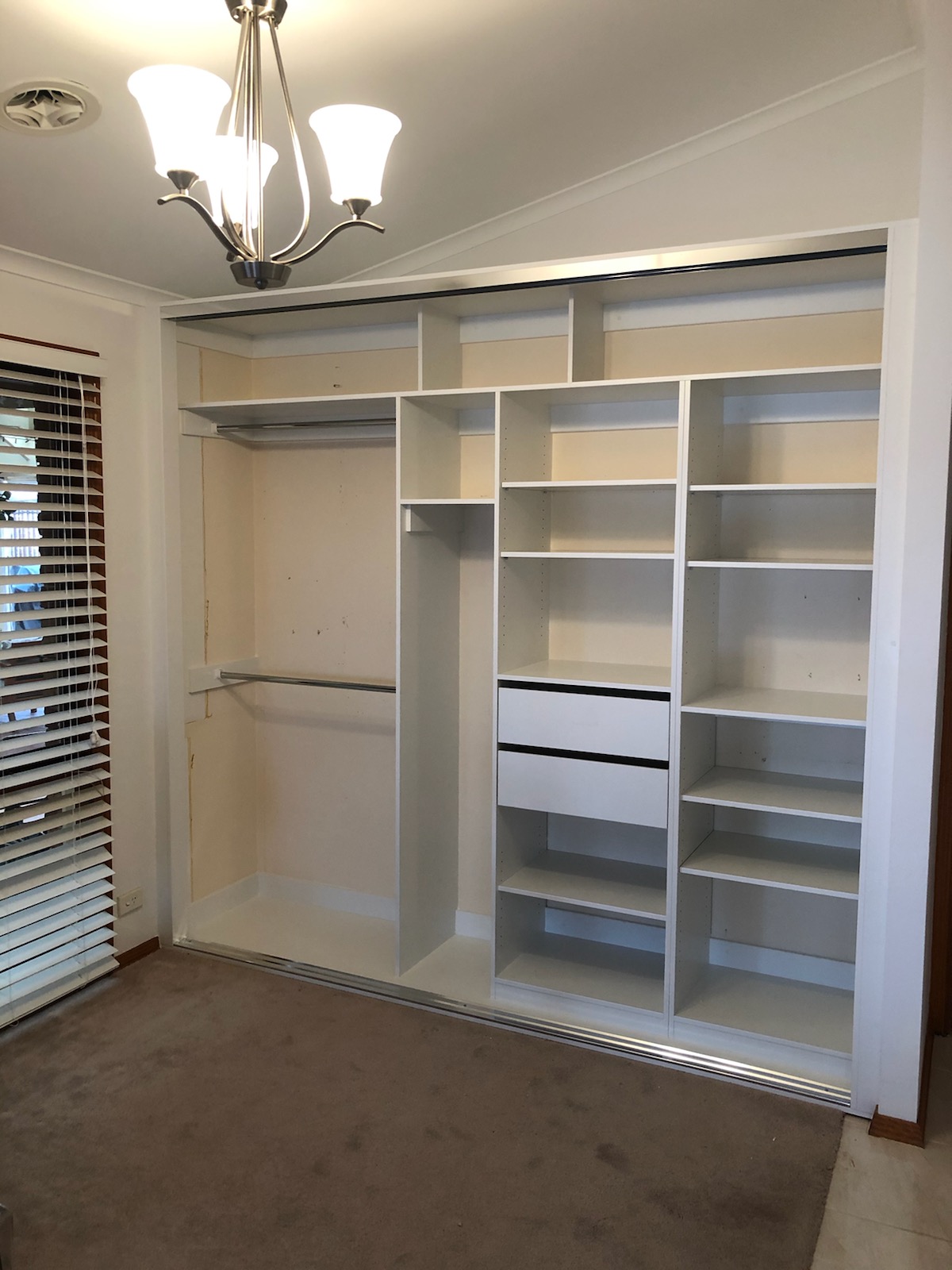 built in wardrobe in melbourne with shelving, hanging space and drawers