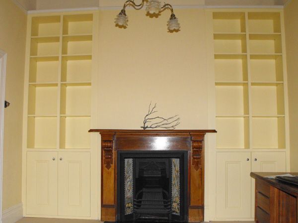 Custom Built Cabinets around Fire place