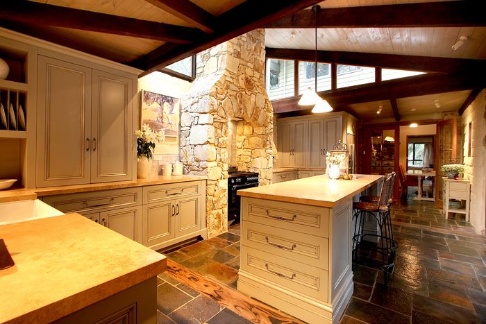 Traditional kitchen with stone benches