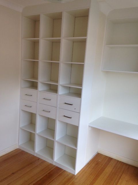 shelving and drawers with a custom made desk