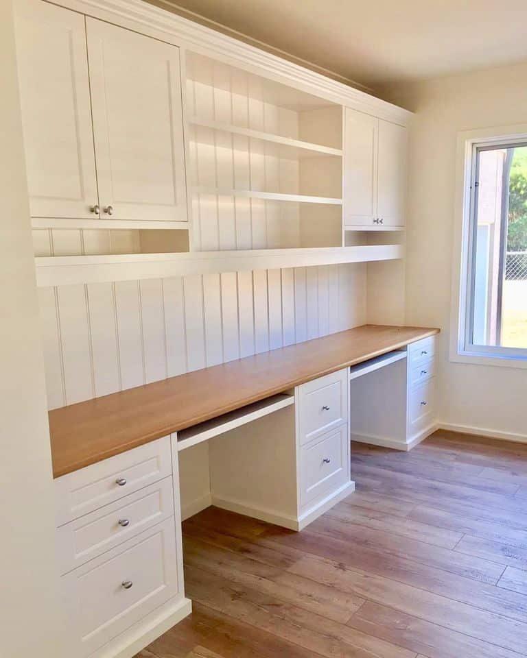 custom white colonial farmhouse shaker style 2 person built in desk with white overhead cabinets